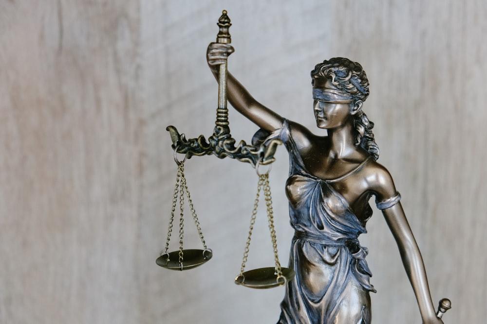 A statue of the scales of justice